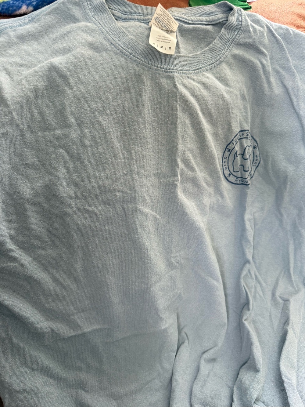 Light Blue Short Sleeve Tee with Small Chest Graphic